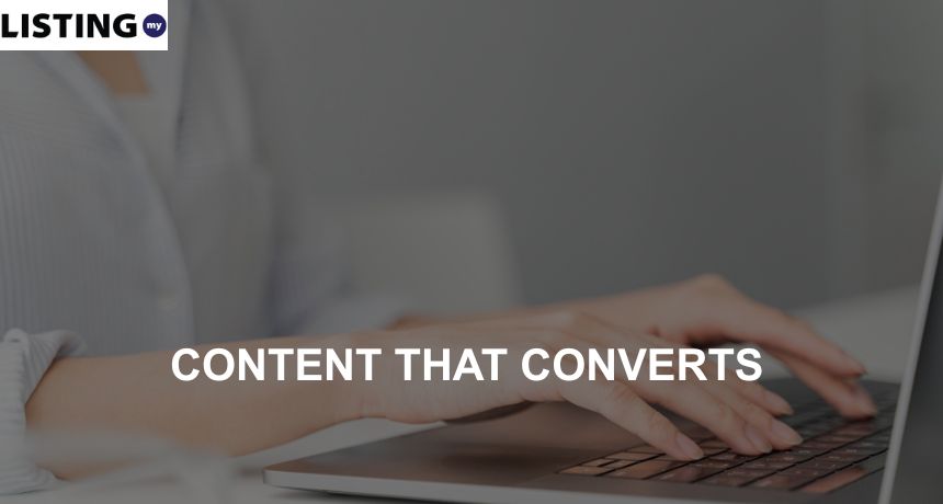 A lady typing out content that converts