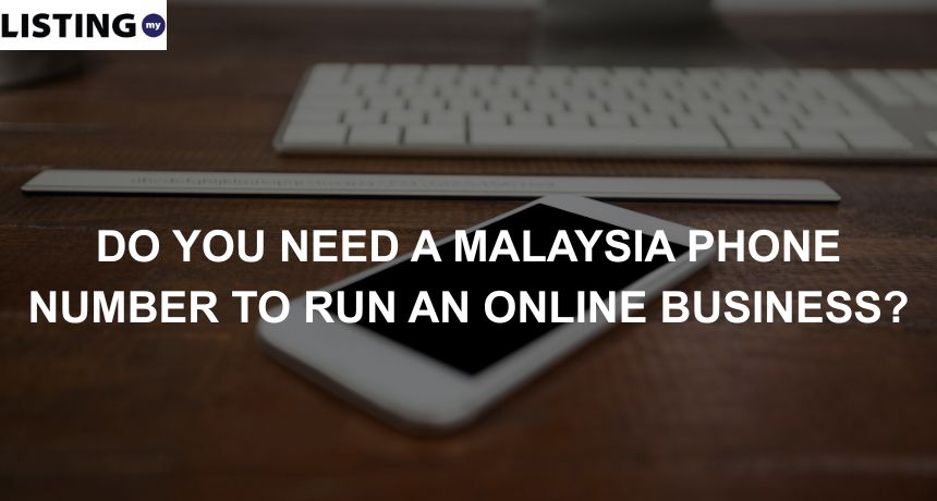 Photo of a phone and a keyboard, symbolizing the need for a Malaysia phone number for online businesses