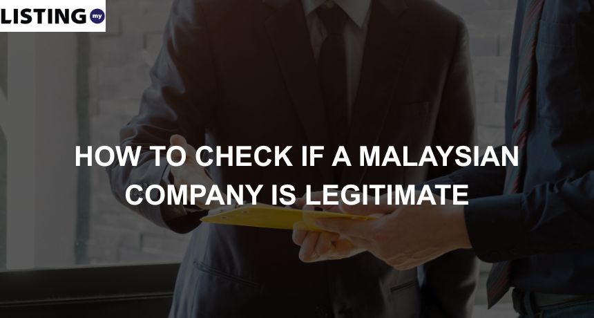 Photo of two people checking a document to determine a business license legitimacy