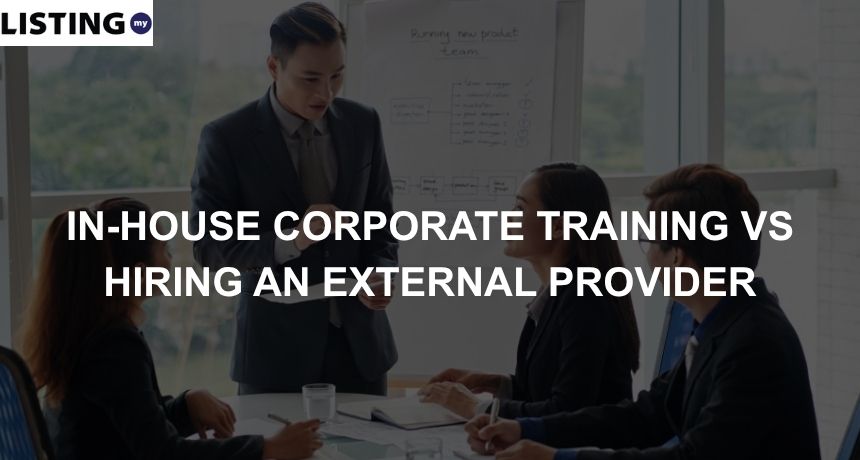 A photo of a corporate training who is conducting a session with trainees