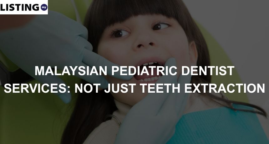 A little girl opening her mouth as the pediatric dentist inspects it